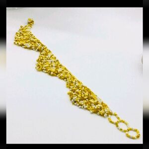 Elegant Yellow and White Beaded Bracelet